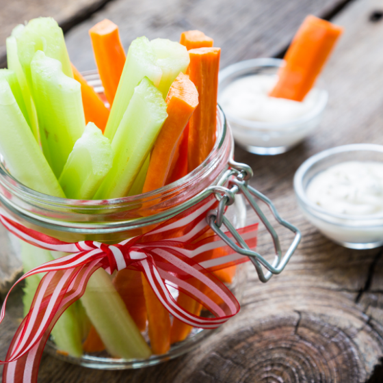 Carrot and celery sticks in a jar
